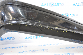 The rear bumper, bare, Mercedes W211 02-09, rest, black, is dented at the bottom, sawed off, the fastening is torn