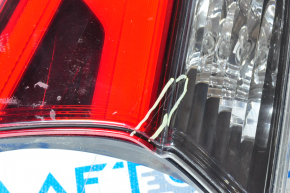 Light inside trunk lid left Nissan Rogue 17-20 scratch