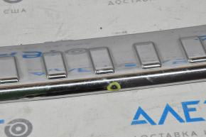 Nissan Rogue 14-17 rear bumper trim chrome, cracked, bump
