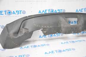 The lip of the rear bumper of the Chevrolet Volt 11-15 is dented on the left, torn, missing fragment, sawed, broken fasteners
