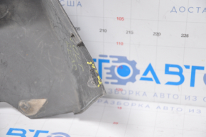 The lip of the rear bumper of the Chevrolet Volt 11-15 is dented on the left, torn, missing fragment, sawed, broken fasteners
