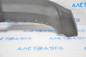 The lip of the rear bumper of the Chevrolet Volt 11-15 is dented on the left, torn, missing fragment, sawed, broken fasteners