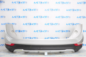 Rear bumper complete Lincoln MKC 15-19 with lights and parking sensors, silver, dented at the bottom