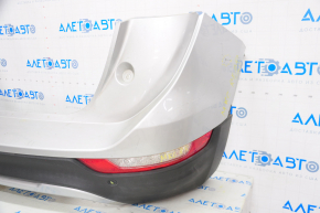 Rear bumper complete Lincoln MKC 15-19 with lights and parking sensors, silver, dented at the bottom