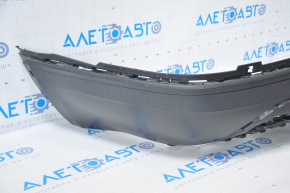 VW Atlas 18-20 rear bumper lip dented on the right