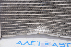 Chevrolet Volt 11-15 inverter cooling radiator is dented at the bottom