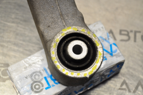 The lower rear left transverse control arm of the Audi A4 B8 08-16 is large and has a torn silent block.