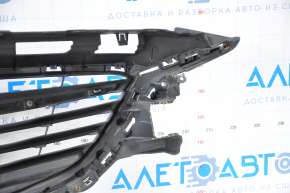Radiator grill Mazda 6 13-17 complete with badge, broken fasteners, crack on molding, chrome bulged, bump on chrome