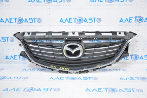 Radiator grill Mazda 6 13-17 complete with badge, cracks in frame, broken fasteners