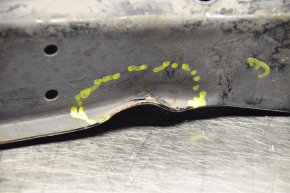 Lower lever under the spring rear left VW Passat b7 12-15 USA is dented, s\b for replacement