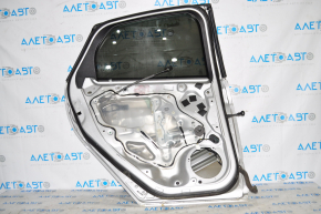 Door assembly rear left Ford Focus mk3 11-18 silver UX dent