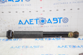 Rear shock absorber left Nissan Rogue 14-17 large silent block, dented