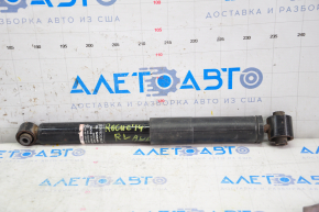 Rear shock absorber left Nissan Rogue 14-17 large silent block, dented
