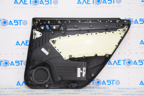 Door trim card rear left VW Passat b7 12-15 USA black, crack in fastening