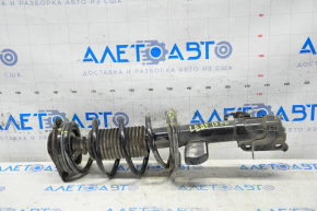 Shock absorber strut assembly front left Nissan Leaf 11-17 dented