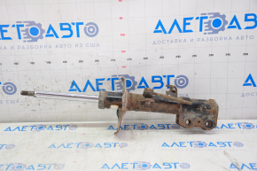Shock absorber front left Toyota Corolla e12 02-06 rusty