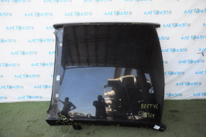Metal roof of a 1919 VW Beetle without a sunroof, sawed off, butts