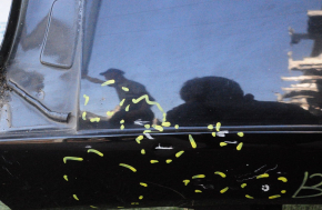 Metal roof of a 1919 VW Beetle without a sunroof, sawed off, butts