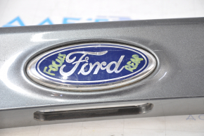 Ford Focus mk3 11-18 prerest 5d trunk door molding with emblem, fastening breaks, scratches on the emblem
