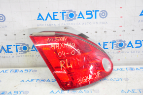 Left headlight Nissan Maxima 04-08 scratches on glass, broken corner