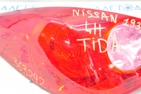 Left headlight Nissan Versa 1.8 10-12 corner broken, scratches on glass