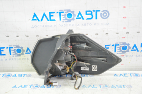 Light outer wing left Nissan Rogue 14-16 chip on corner