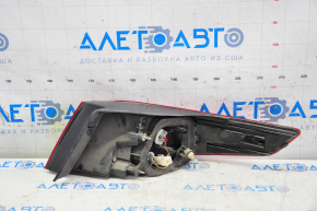 Left outer fender light for a Kia Optima 2011-2013 pre-restoration model, chipped glass