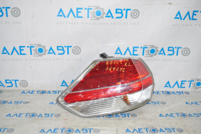 Light outer wing left Nissan Rogue 14-16 crack on glass and housing, broken fastener, chip