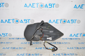 Light outer wing left Nissan Rogue 14-16 crack on glass and housing, broken fastener, chip