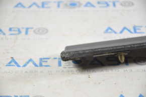 Lower front right door trim Nissan Rogue 14 is worn