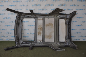 Metal roof for a Mercedes W164 ML with a sunroof, sawn off and dented.