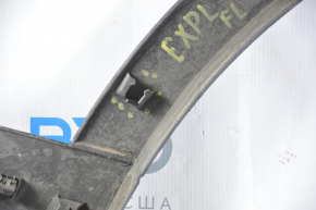 Front right wing arch trim Ford Explorer 11-15 pre-restoration, broken fastener, worn