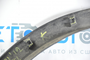 Front right wing arch trim Ford Explorer 11-15 pre-restoration, broken fastener, worn