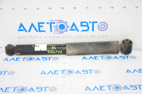 Rear shock absorber left Nissan Rogue 14-17 fwd large silent block, cracked silent blocks, dented, crooked