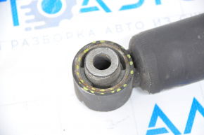 Rear shock absorber left Nissan Rogue 14-17 fwd large silent block, cracked silent blocks, dented, crooked
