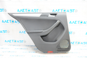 Door trim card rear left VW Jetta 11-18 USA black with black insert plastic, armrest leather, molding gray gloss type 1, scratch