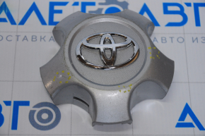 Toyota RAV4 wheel center cap worn, scratches