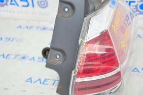 Light outer wing right Nissan Rogue 14-16 chip on glass