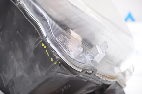 Headlight front left bare Fiat 500 12-19 broken fastener there is an element