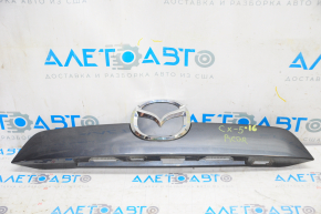 Mazda CX-5 13-16 trunk door molding under the button, with emblem, broken fastener