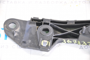 Front bumper mount left Mazda CX-5 13-16 on the wing, broken guide