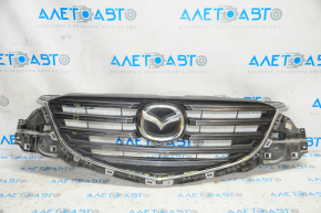 Radiator grill Mazda CX-5 15-16 complete with badge, crack, broken fastener, scratches, sand