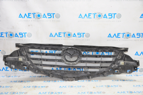 Radiator grill Mazda CX-5 15-16 complete with badge, crack, broken fastener, scratches, sand