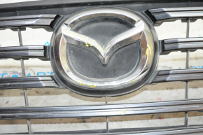 Radiator grill Mazda CX-5 15-16 complete with badge, crack, broken fastener, scratches, sand