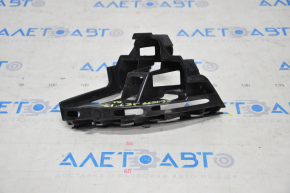 Rear bumper mount under the left light VW Jetta 15-18 USA broken guide