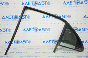 Rear left triangle door glass for a Cadillac CTS 14-19, complete with glass seal