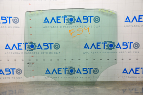 Rear left door glass for a Cadillac CTS 14-19