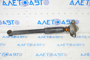 Shock absorber rear left VW Beetle 12-16 with support under the beam, cracked silent block