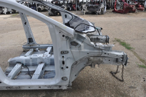 Front right quarter Ford Escape MK3 13-14 pre-restoration on the body white, bump