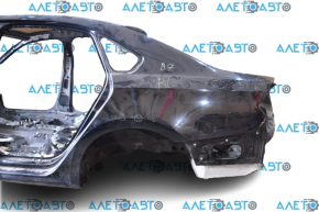 Quarter wing rear left VW Passat b7 12-15 USA black L041 on the body, small bumps, scratch